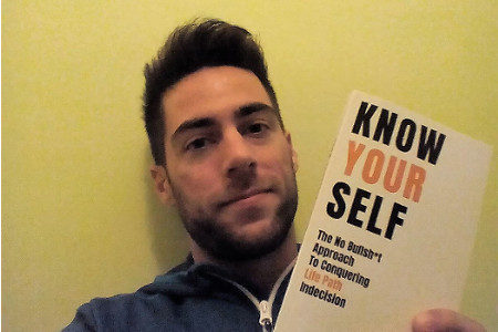 Stefano Pecci with his book "Know yourself"