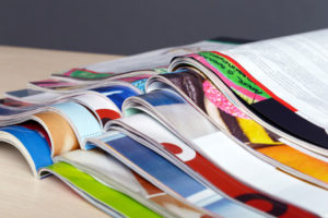Pile of colourful magazines