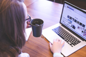 Woman at computer exploring the Internet