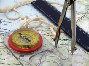 Map, compass and sextant for planing